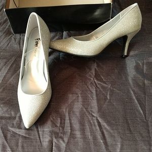 Silver shoes never worn!!